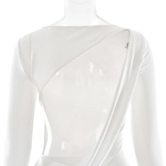 White dress on a mannequin with a plain background