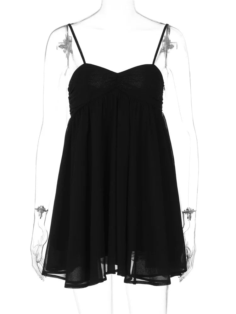 Black dress on a mannequin with a white background