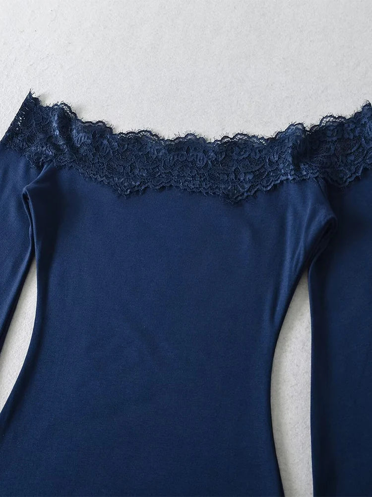Close-up of the lace trim on the off-shoulder neckline