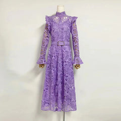 Purple lace dress on a mannequin against a white background