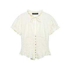 White blouse with ruffled details on a white background