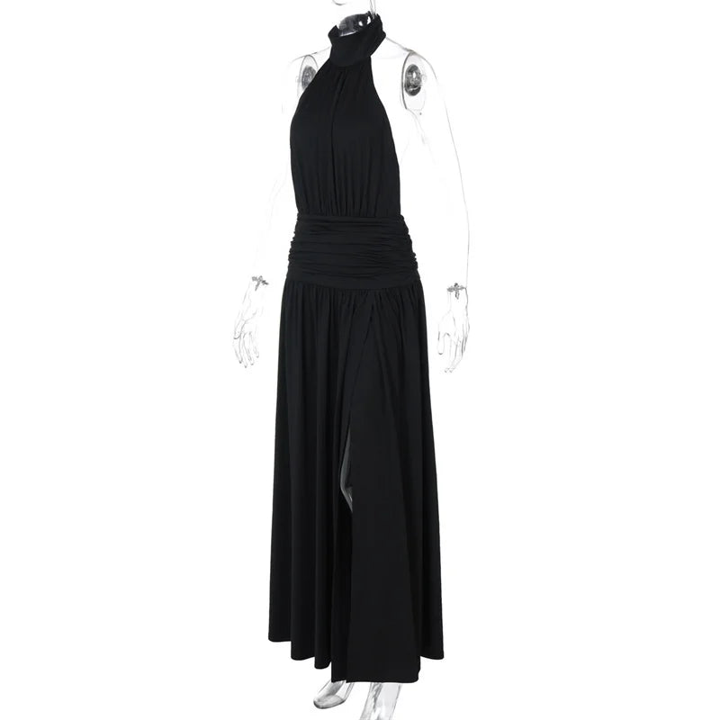 Black halter neck dress on a mannequin against a white background