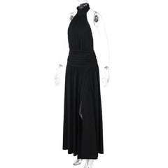 Black halter neck dress on a mannequin against a white background
