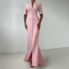Pink dress with a high slit on a white background