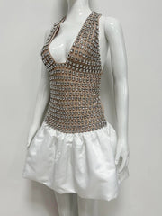 Crystal embellished halter mini dress on mannequin, side view