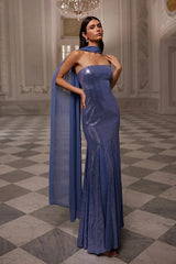 Model wearing a strapless sequin column evening gown