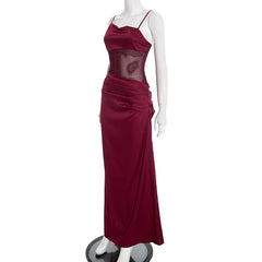 Maroon evening gown on a mannequin against a white background