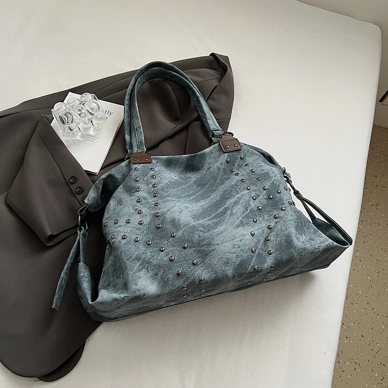 Blue studded PU leather shoulder bag