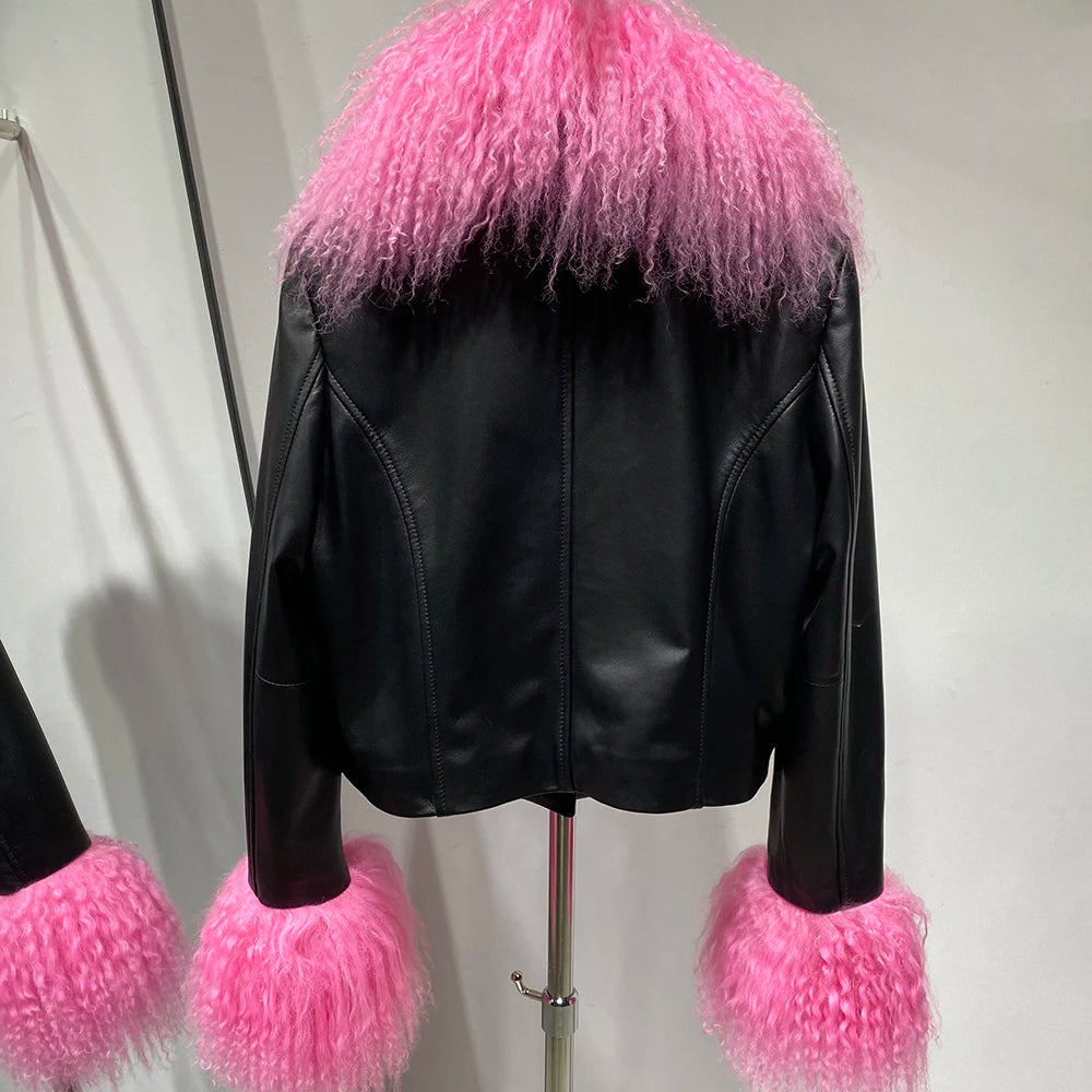 Black leather jacket with pink fur trim on a mannequin against a plain background