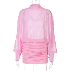 Pink ruched dress on a mannequin with a white background