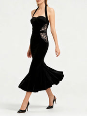Slim halter dress styled for evening occasions