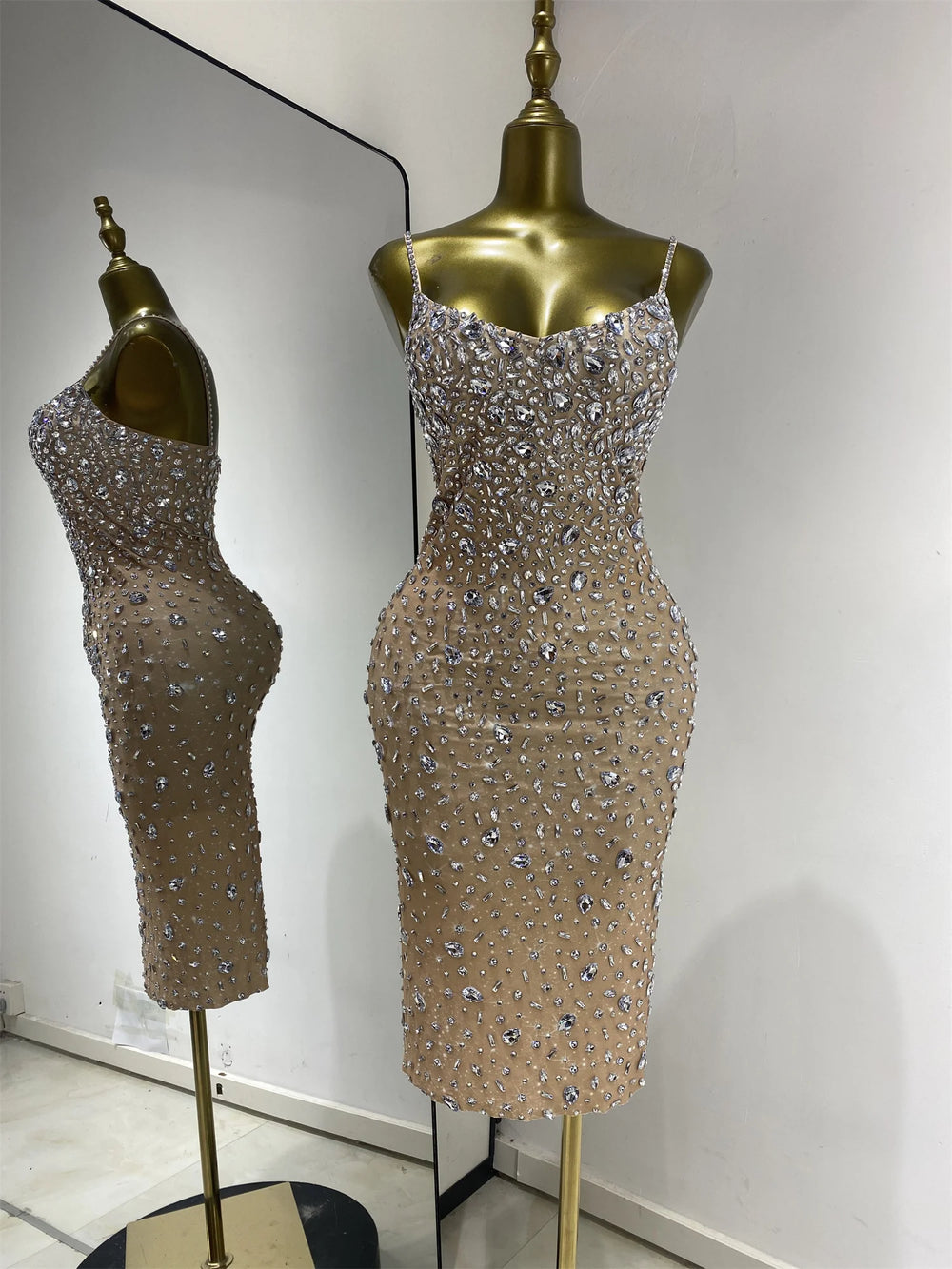 Crystal embellished spaghetti strap knee length dress detail