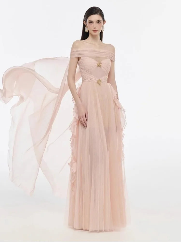 Off-the-shoulder mesh evening gown with flowing capelet
