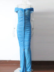 Blue strapless gown on a mannequin against a white background