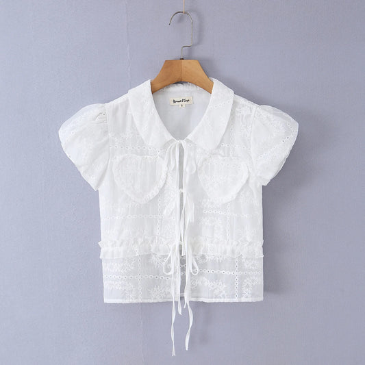 White embroidered puff sleeve crop top with tie front