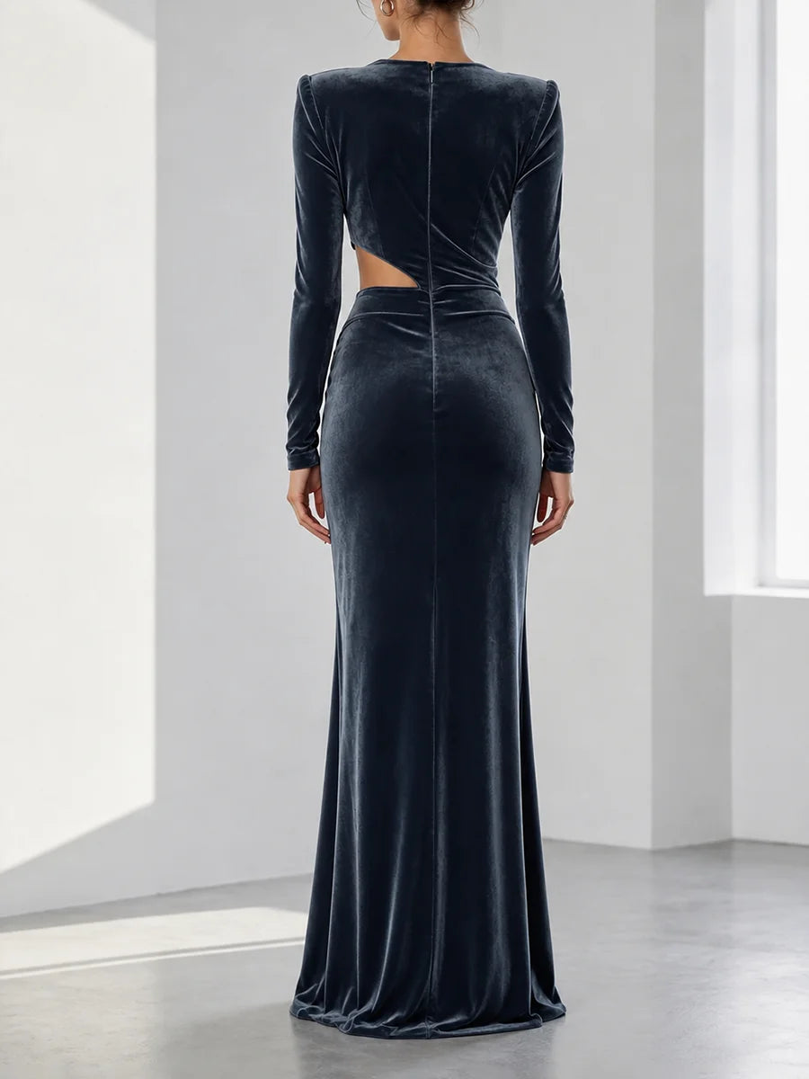 Velvet V-neck maxi dress with cut-out detail and high slit, back view.
