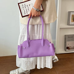 Lavender short handle tote bag with zipper closure.