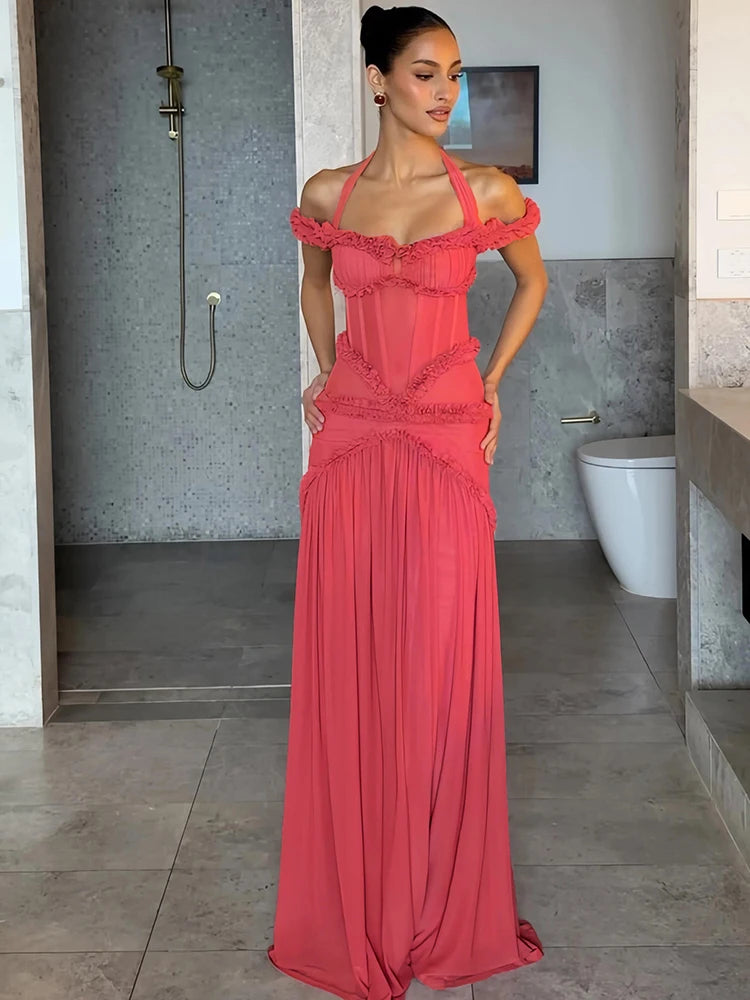 Ruffled halter neck maxi dress in coral pink on model