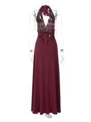 Maroon evening gown on a mannequin against a white background