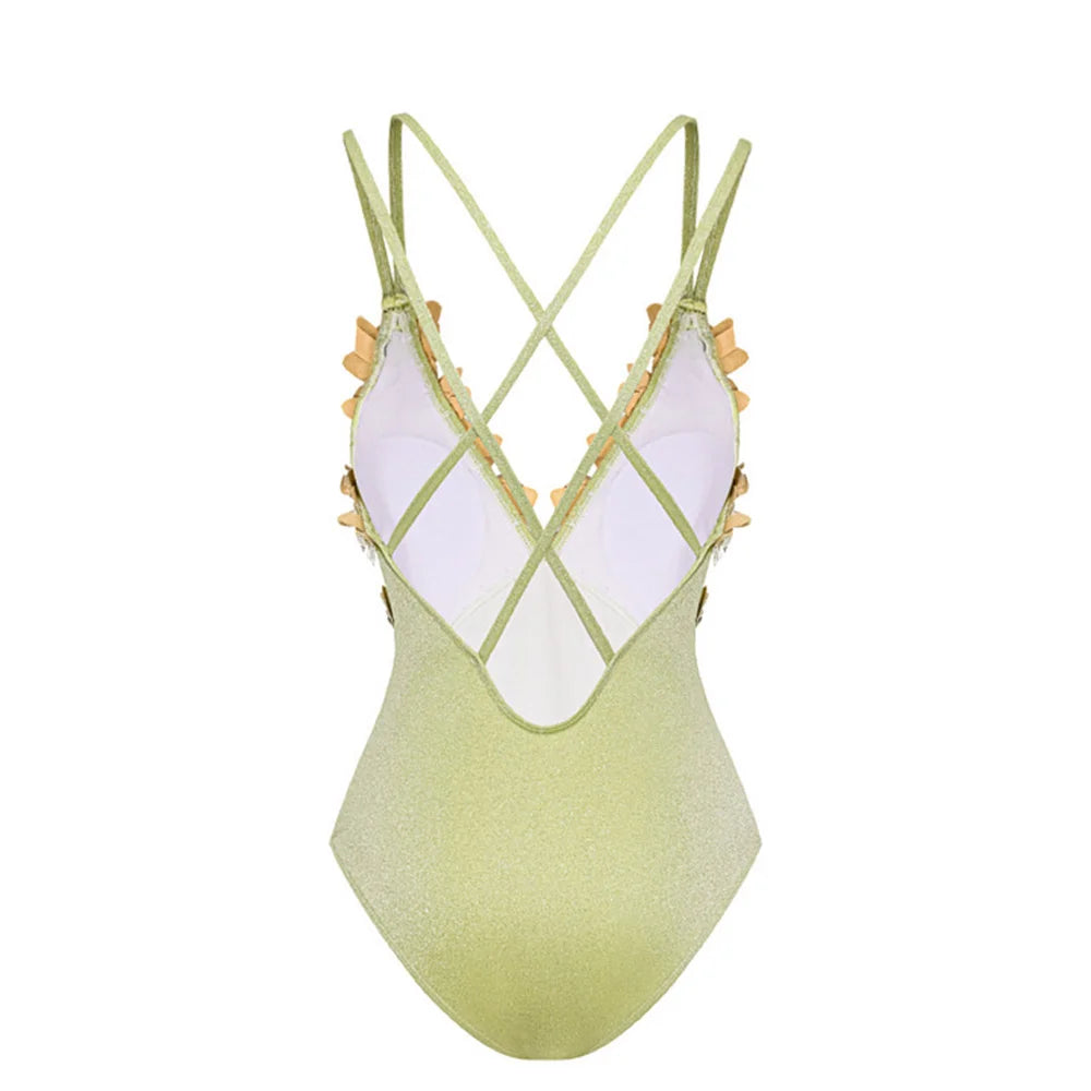 Back view of the sparkling embellished swimsuit showing crisscross straps.