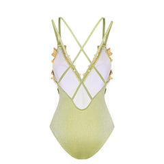 Back view of the sparkling embellished swimsuit showing crisscross straps.
