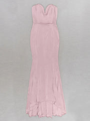 Pink strapless gown on a gray background
