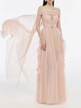 Pink off-shoulder gown with a sheer overlay