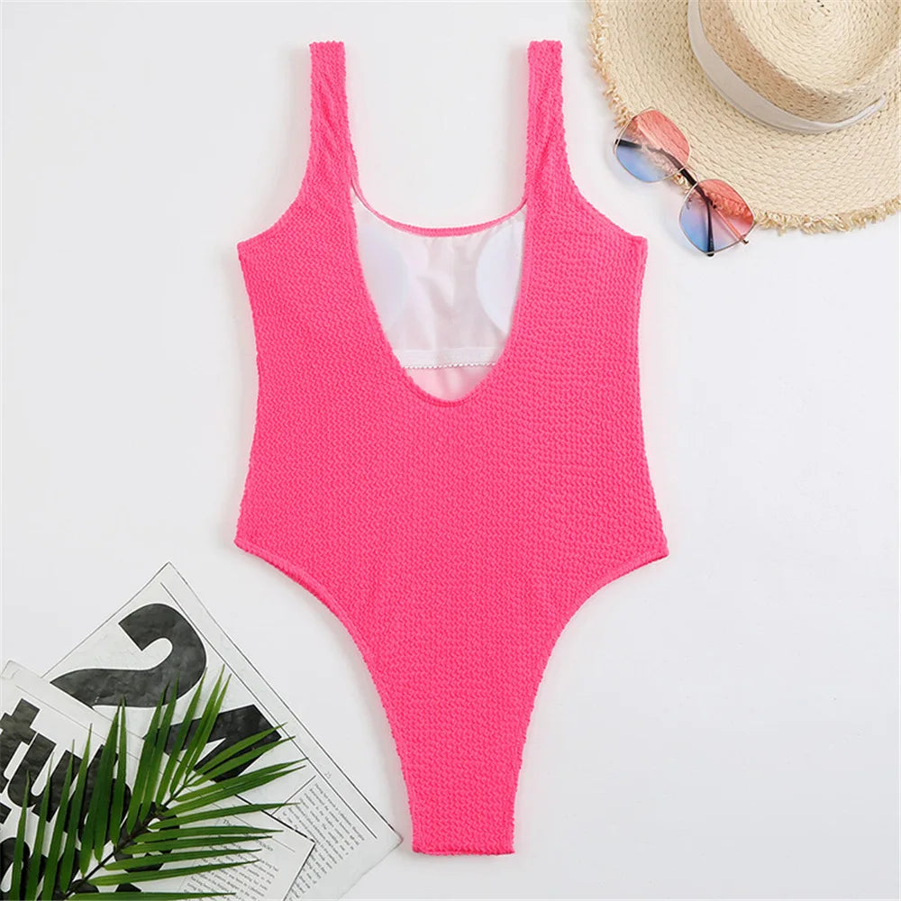 Back view of pink ribbed high-cut one-piece swimwear
