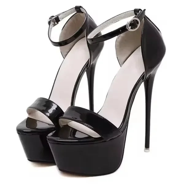 Black high-heeled platform sandals on a white background