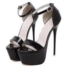 Black high-heeled platform sandals on a white background