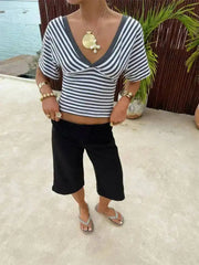 V-neck striped knit cropped top with dolman sleeves and ruched front