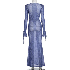 Blue sheer dress on a mannequin against a white background