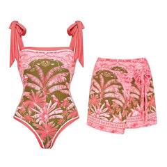 Tie-shoulder square neck one-piece swimsuit with botanical palm print and matching wrap skirt.