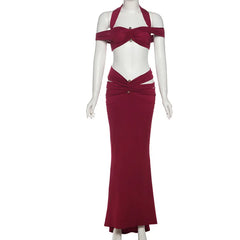 Red halter top and skirt set on a mannequin against a white background