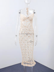 White lace dress on a mannequin against a white background