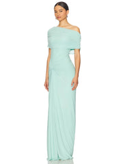 Woman wearing a light blue off-shoulder gown on a white background