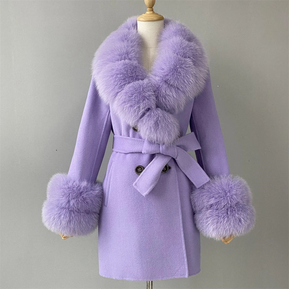 Purple coat with fur accents on a mannequin against a gray background