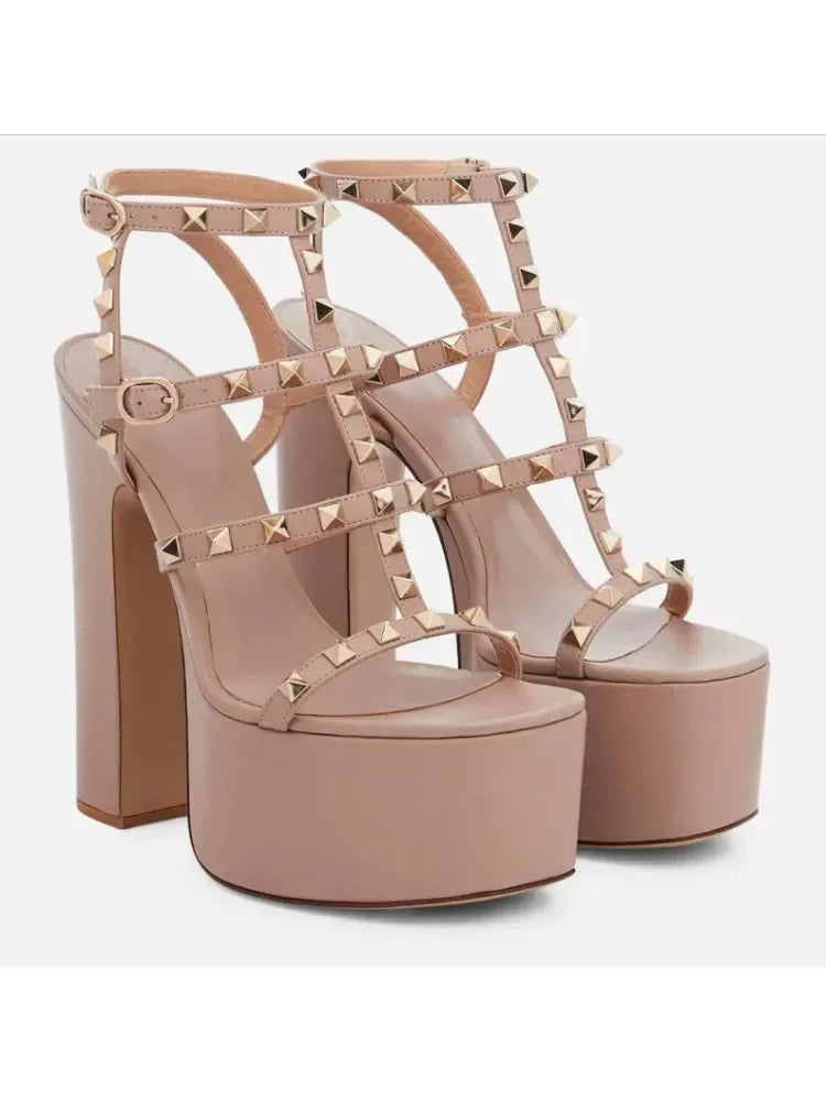 Beige high-heeled platform sandals with studded details