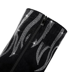 Black high-heeled boots with rhinestone embellishments on a white background