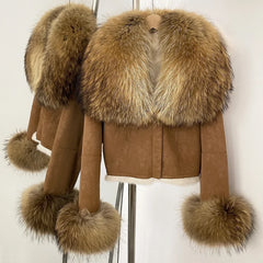 Brown suede jacket with fur trim on a mannequin against a white background