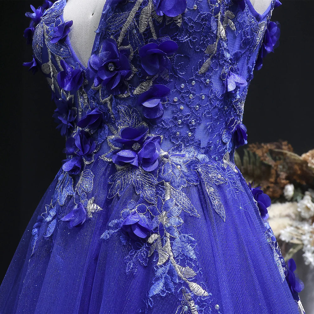 Blue floral dress on a mannequin against a dark background