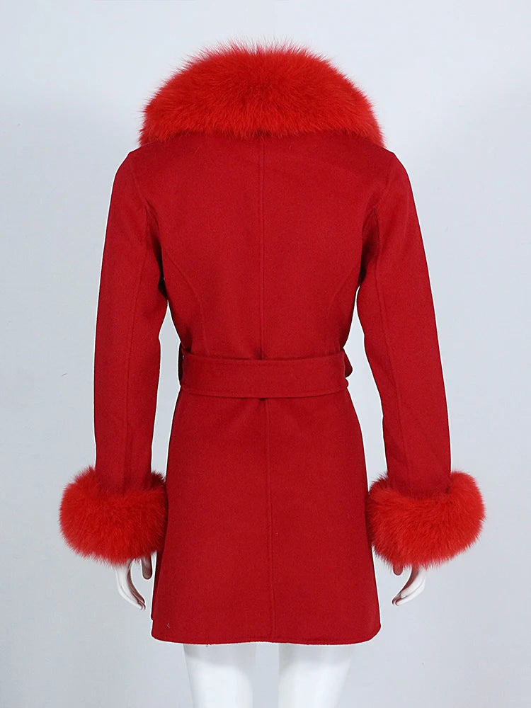 Red coat with fur trim on a white background