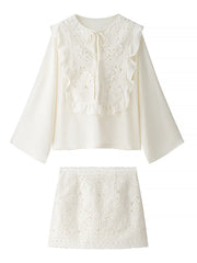 White lace top and skirt set on a white background