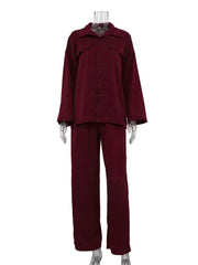 Maroon outfit on a mannequin against a white background