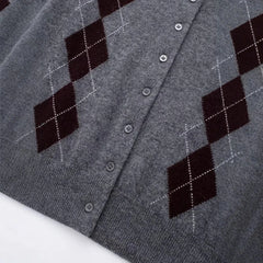 Gray cardigan with argyle pattern on a white background