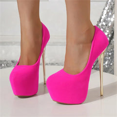 Hot pink high-heeled shoes on a neutral background