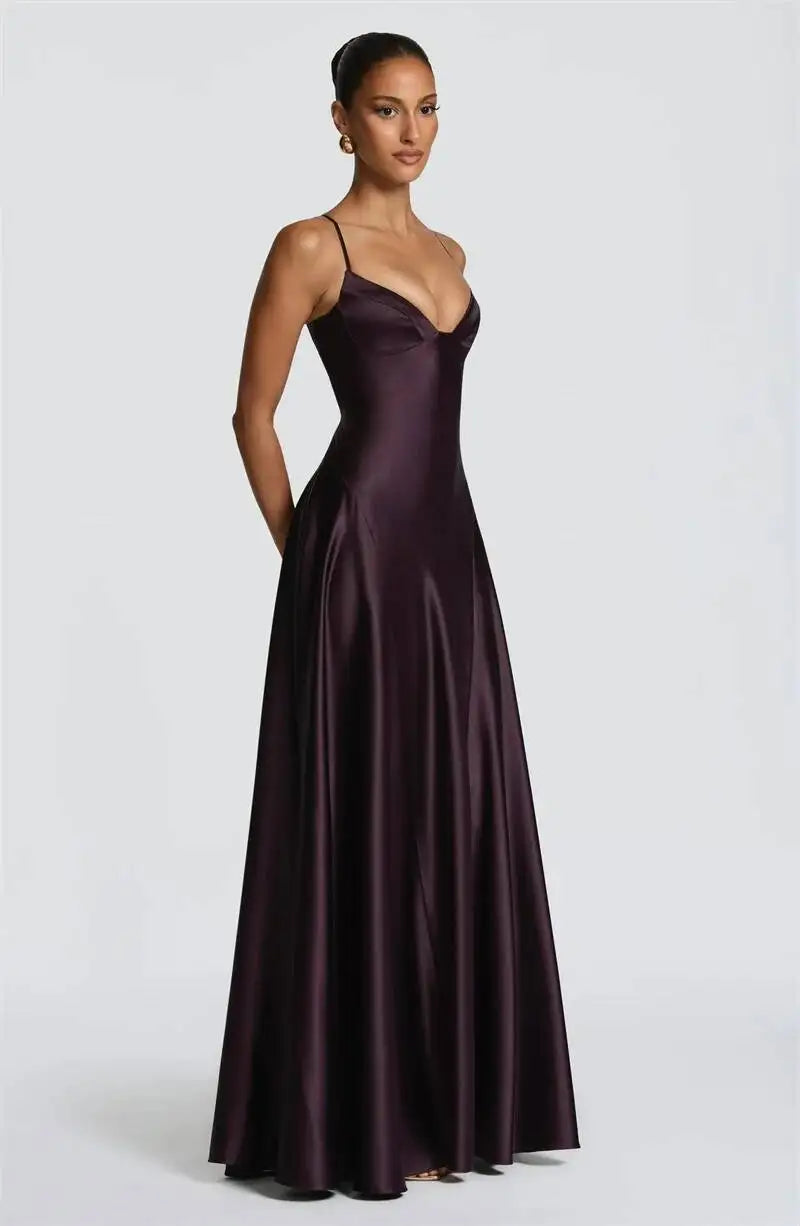 Side view of purple satin spaghetti strap deep V-neck maxi dress
