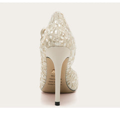 Sparkly high-heeled shoe on a white background
