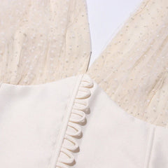 Close-up of a textured fabric with ruffled edge on a light background