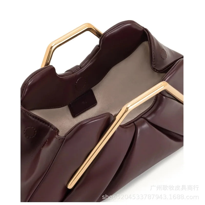 Brown handbag with gold accents